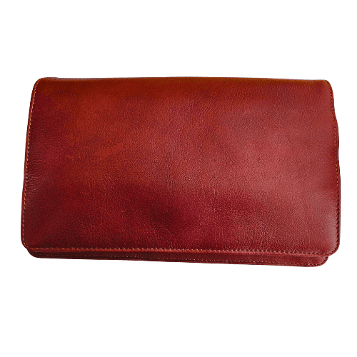 Whiskey color cross body bag with full front flat.