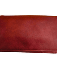Whiskey color cross body bag with full front flat.