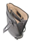 Interior view of Derek Alexander two sided crossbody bag showing organized compartments and beige lining for practical storage.