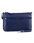 Navy leather crossbody bag with top zip closure, a front zippered compartment, and a removable shoulder strap.