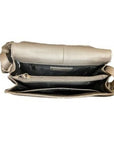 Interior of E/W organizer bag in pewter. Black lining with Derek Alexander branding. Features a zippered compartment.
