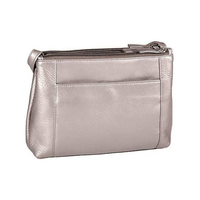 Interior side of silver leather purse, featuring a slip pocket with a magnetic closure.