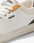 Detailed side view of Moea Gen3 All-In Vegan Sneakers showing brand logo and multi-textured vegan materials in a stylish low-top design.