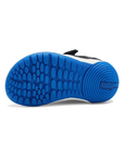 Blue outsole with circle bubble pattern and Merrell logo on heel.