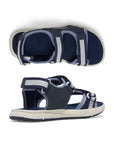 Side and top views of navy Kids Merrell Panther 3.0 sandal featuring triple adjustable straps and cushioned EVA footbed for all-day comfort.