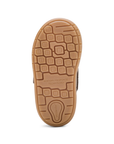 Tan outsole with sensory technology tread pattern and Stride Rite logo on heel.