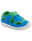 Toddler Stride Rite Splash water shoe in blue and green with dinosaur design, featuring quick-dry upper, Velcro strap, and flexible sole.