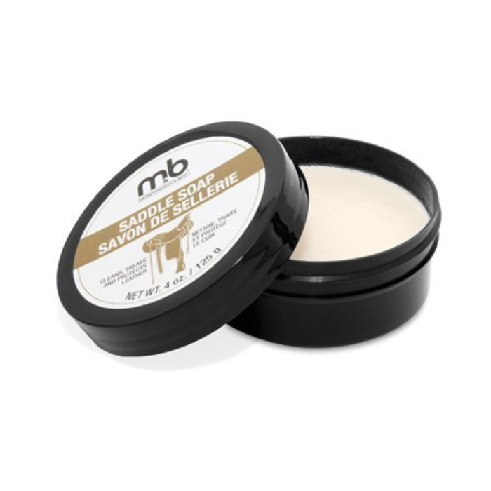 Moneysworth & Best Saddle Soap in open black container, premium leather cleaner for removing dirt and oil from shoes and leather goods.