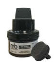 Black shoe polish with sponge applicator.