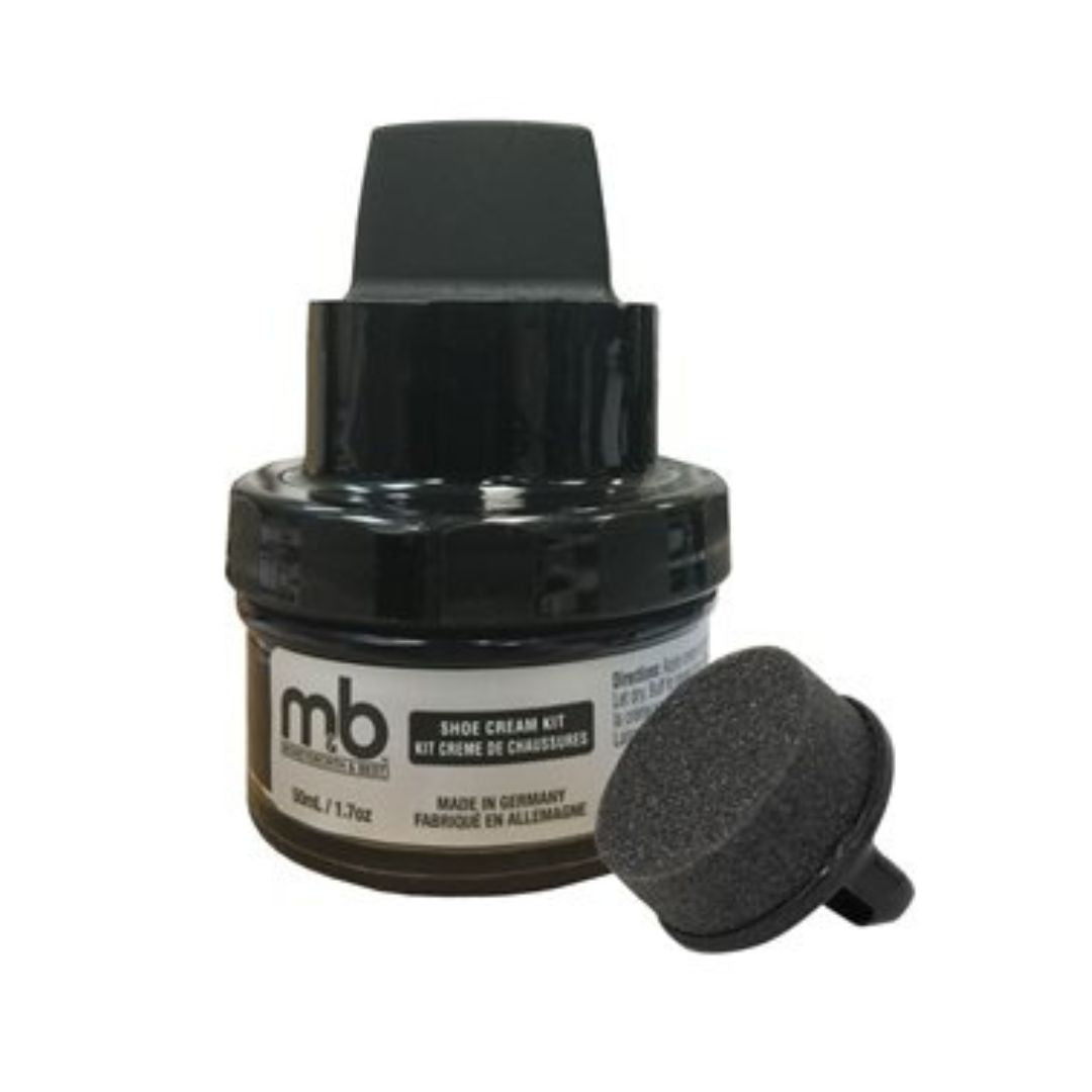 Black shoe polish with sponge applicator.