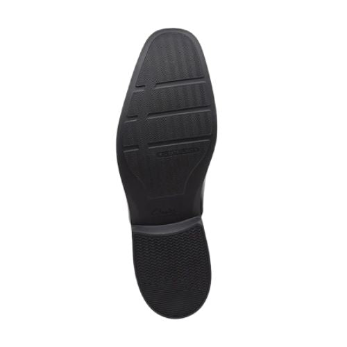 Bottom sole view of black Clarks Clarkslite Ave men's dress shoe featuring durable rubber outsole with anti-slip tread pattern.