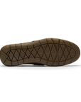 Brown geometric patterned outsole with Clarks logo stamped on side.