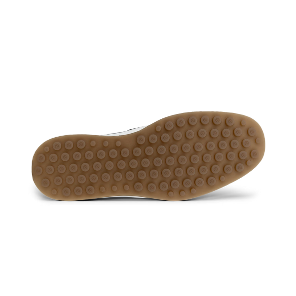 An Ecco brown outsole of raised rubber circles, each with a lowercase "e" inside .