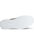 White light treaded outsole with circle pattern and Ecco logo in middle.
