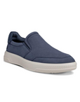 Navy slip-on shoe with accent stitching and a white outsole.