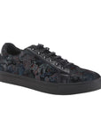 Black lace-up shoe with a multicoloured paisley print upper, a black outsole, and black laces.
