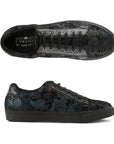 Top and side view of Ander Floral sneaker. L'Artiste logo is printed on the insole.