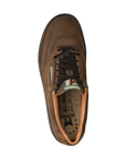 A brown suede low-top sneaker with black laces, a dark brown sole, and a green and white 'MEPHISTO' logo patch on the side and on tongue.