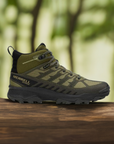 Men's Merrell Speed Eco Mid WP Boot displayed outdoors on a log, emphasizing its waterproof build and eco-conscious hiking design.