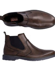 Brown leather Chelsea boot with navy elastic side goring. Rieker logo on heel of insole.