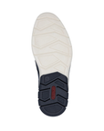 Rubber outsole, half white and half navy with red Rieker logo on navy part at heel.
