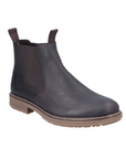 Black leather chelsea boot with elastic side panels, pull tabs and tan outsole.