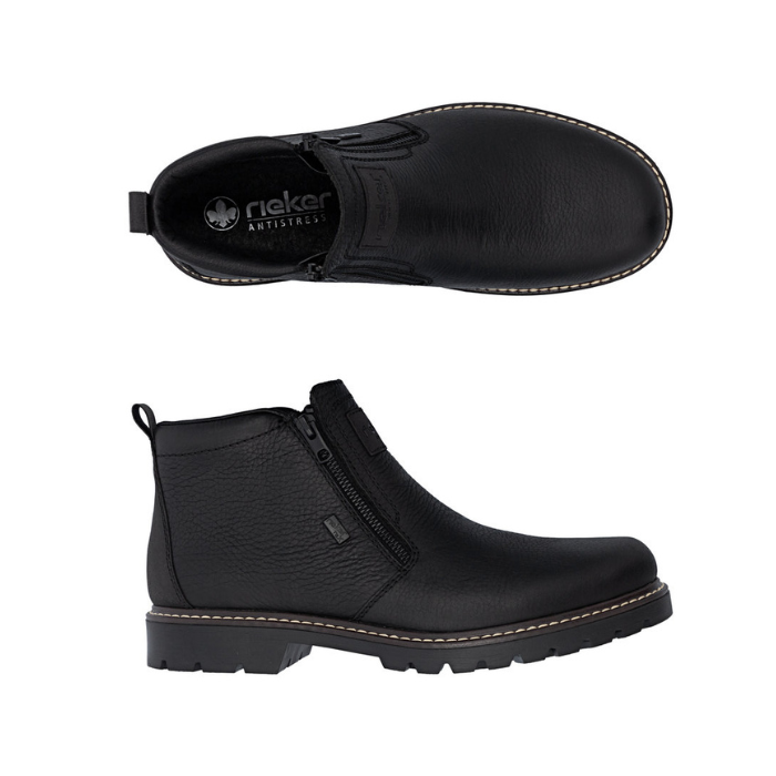 Pair of Black leather ankle boot with dual side zippers , black Rieker logo'd footbed and a black rugged rubber outsole.