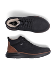 Pair of Black lace-up ankle boots with brown accent heel counter, brown midsole wrap, white fleece lining and black treaded outsole.