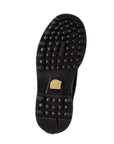 Bottom view of brown Men's Sorel Caribou Winter Boot showing rugged rubber sole with deep lugs and Sorel branding for winter traction.