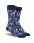 Cotton crew socks in navy blue featuring cute otters holding paws.