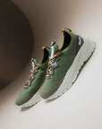 Moea Gen6 Pineapple Laced Sneakers in green with eco-friendly knit upper, white sole, and cotton laces. Sustainable women's shoes made from pineapple fibers.