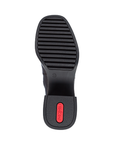 Black line treaded outsole with red Rieker logo on thick block heel.