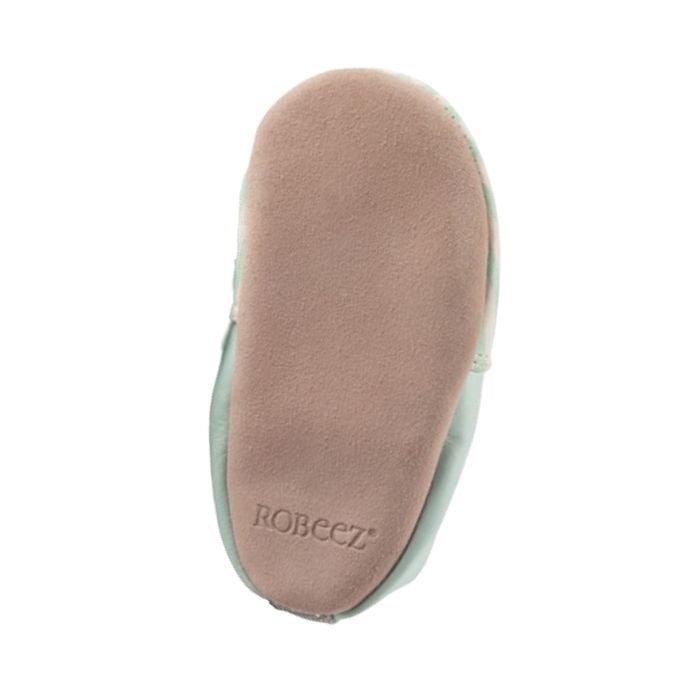 Beige suede outsole with Robeez logo on heel.