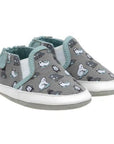 Gray baby shoes with soft soles featuring a variety of artic mammals playing in the ice.