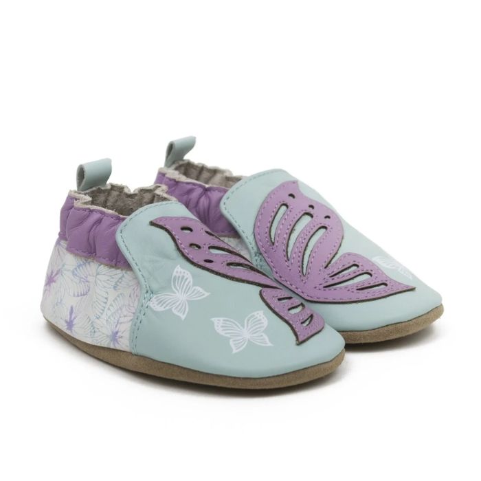 Aqua and purple baby shoes with butterfly designs, white prints, and soft brown soles.