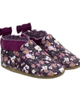 Dark purple baby shoes with deep pinks, purples and white poppy pattern and a little purple bow on heel.