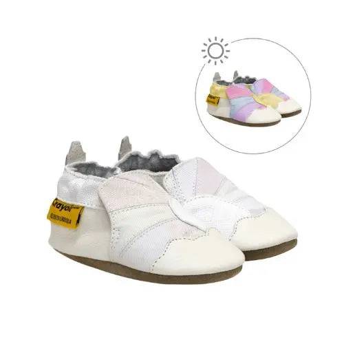 Pair of rainbow patterned kids shoes that change colour in the sun.
