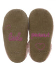 Suede soles of Robeez Little Peanut Soft Soles baby shoes with embroidered 'little peanut' text, promoting barefoot-like comfort for infants.