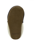 Bottom view of Robeez Shine Bright Soft Sole baby shoes showing flexible suede outsole for barefoot-like comfort.