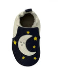 Top view of Robeez Shine Bright Soft Sole baby shoes featuring a smiling moon and yellow stars on navy leather.
