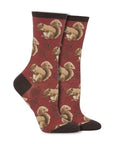 Red socks with squirrels and maple leaves.
