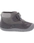 Side view of Kids Stride Rite Felix Soft Motion Bootie featuring flexible sole and soft materials for first-time walkers.