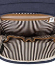 Close-up of inner organizer panel in Travelon Anti-Theft Heritage Backpack with RFID-blocking pocket and striped fabric lining.