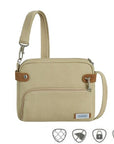 Beige Travelon Anti-Theft Heritage Crossbody handbag with RFID protection and locking compartments, available at White-Balmer Shoes.