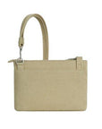 Back view of the beige Heritage Anti-Theft Crossbody Bag highlighting its minimalist design and durable fabric for everyday wear.