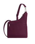 Back of a burgundy nylon shoulder bag with zippered pockets and a silver metal carabiner.