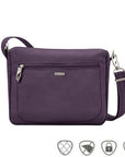 Purple Travelon Anti-Theft Small E/W Crossbody with front zip pocket and anti-theft features including RFID blocking and cut-proof strap.
