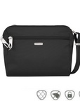 Small black crossbody bag with silver Travelon logo in center below full length zipper.
