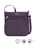 Purple Travelon crossbody bag with multiple zippered compartments and an adjustable strap, shown with icons for anti-theft, cut-resistant, locking zippers, and RFID protection.