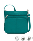 Spruce-colored Travelon crossbody bag with multiple zippered compartments and an adjustable strap, shown with icons for anti-theft, cut-resistant, locking zippers, and RFID protection.